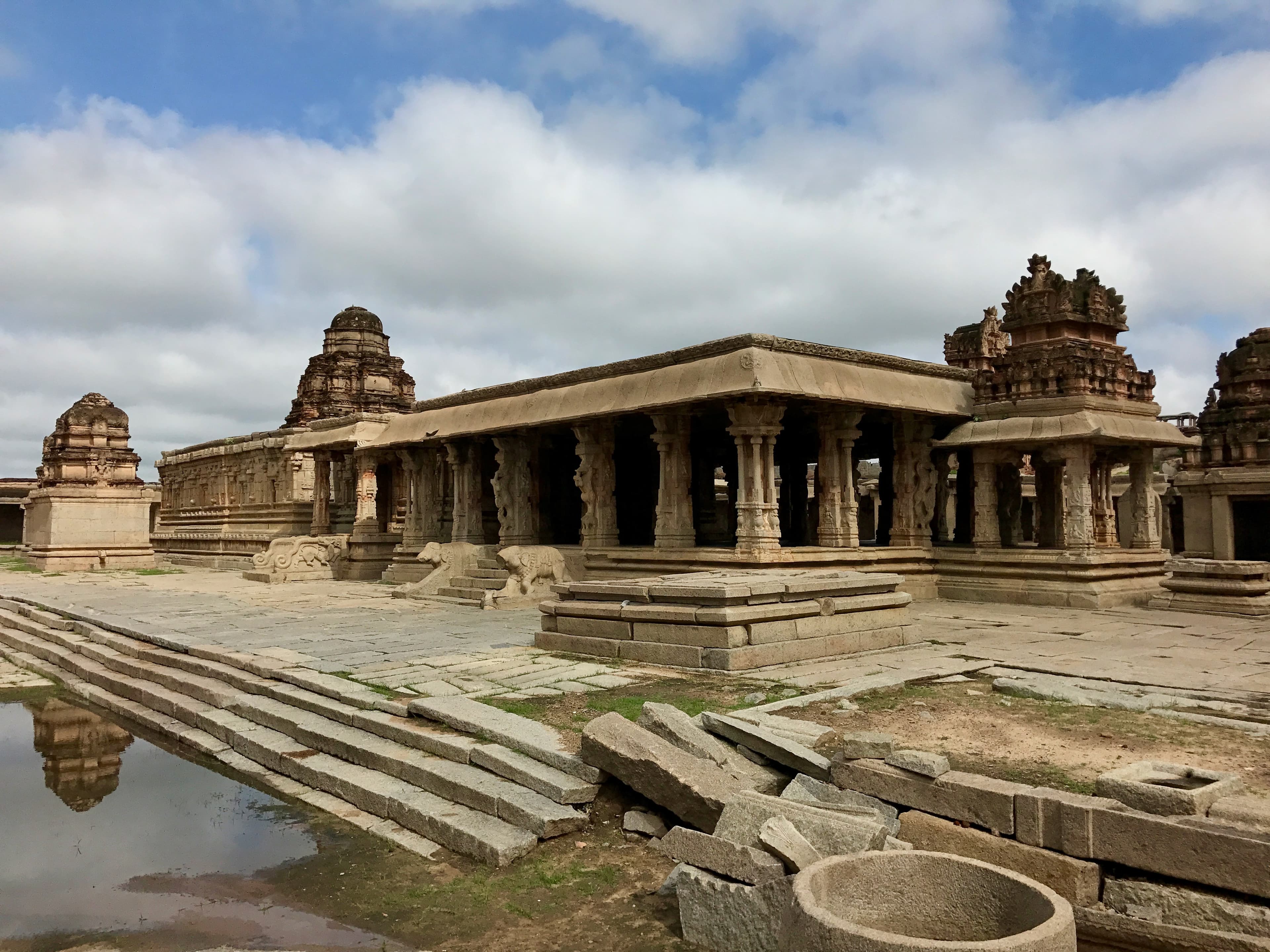 Stone temple structures at Bala Krishna Temple in Hampi, Karnataka, India.